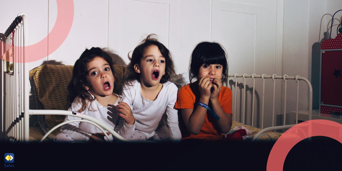 Children watching TV in bedroom